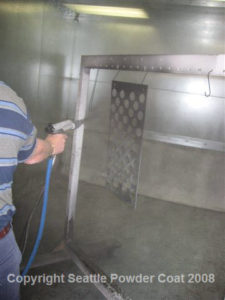 Applying Powder In Batch Booth 